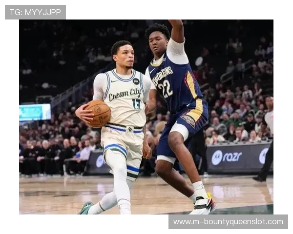 雄鹿团队篮球体系险胜鹈鹕，七人得分上双终结连败